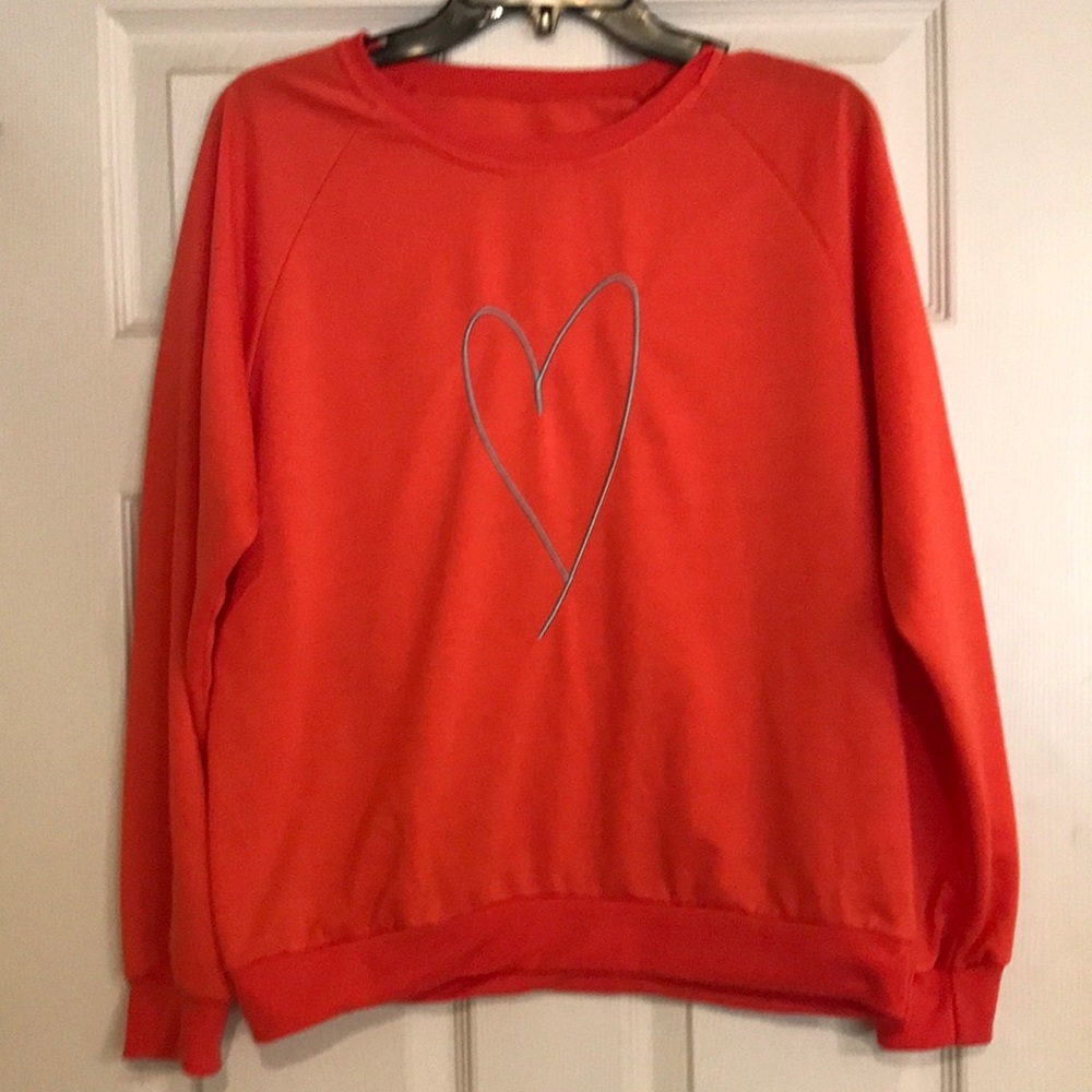 Red crew sweatshirt with gray embroidered heart